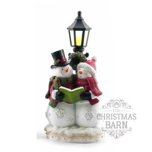 Snowmen Under Street Light